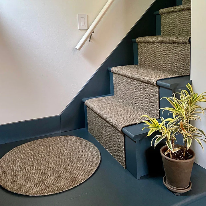 Stair carpet installation in a modern home interior